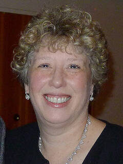 Headshot of a smiling Rabbi Sally Finestone